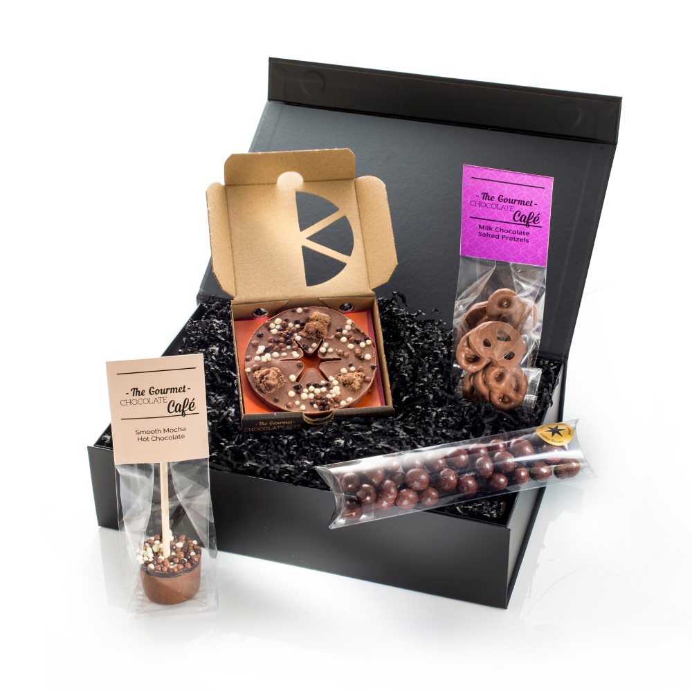 Elegant black hamper box with mini coffee chocolate pizza, milk chocolate pretzels, a mocha hot chocolate stirrer and dark chocolate coffee beans.
